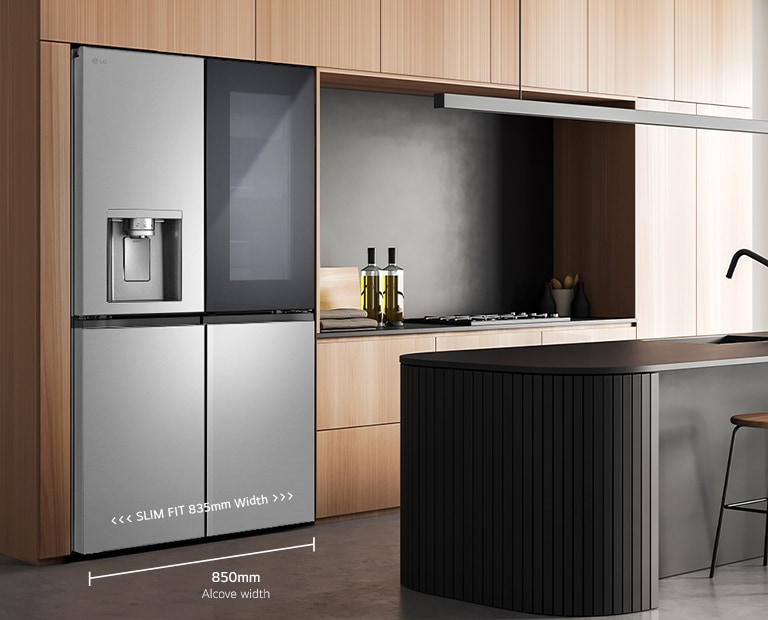 Modern kitchen interior with InstaView fridge.