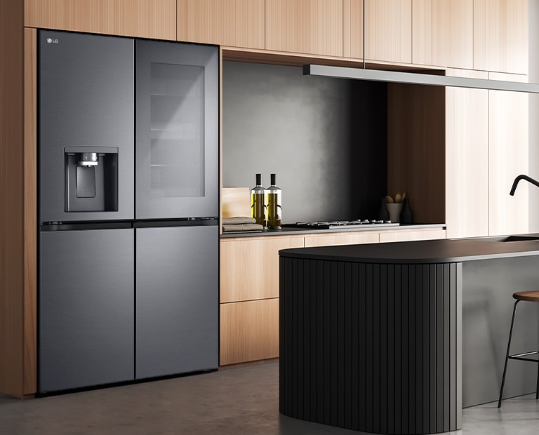 Modern kitchen interior with InstaView fridge.