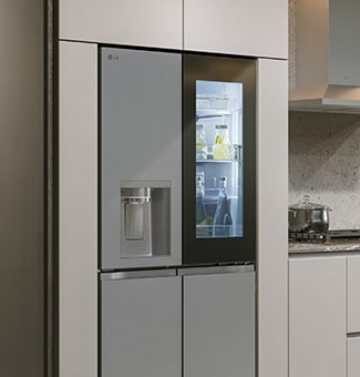 Modern kitchen interior with InstaView fridge.