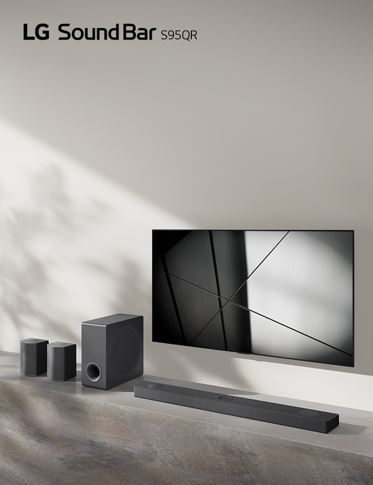 LG sound bar S95QR and LG TV are placed together in the living room. The TV is on, displaying a black and white image.