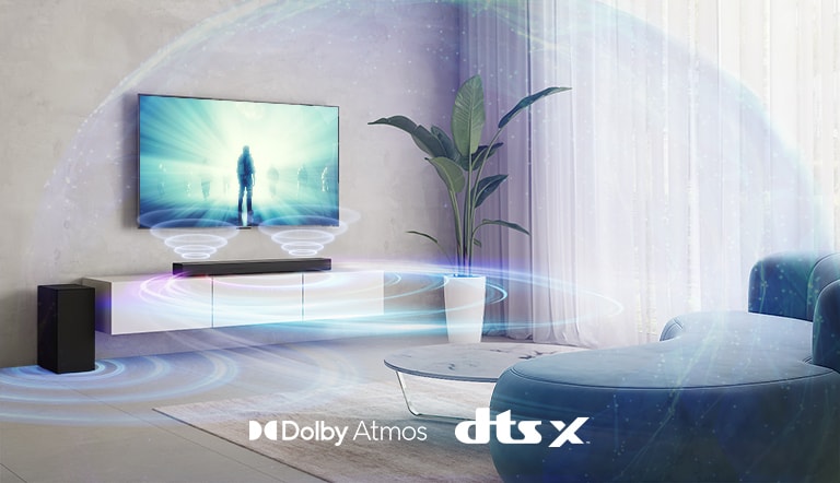 In the living room, LG TV is on the wall. A moive is playing on TV screen. LG Sound bar is right below TV on a beige shelf with a rear speaker is placed on left. Dolby Atmos and DTS:X logo shown on middle bottom of image.