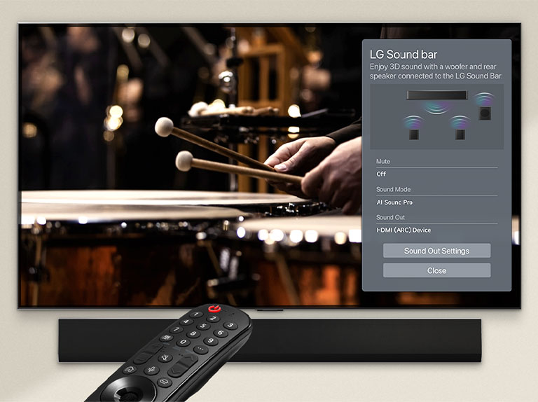 An image of a remote control pointed at an LG OLED TV showing soundbar control settings on the right side of the screen.