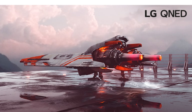 There is a red fighter plane and an image is divided into two – left half of image seems less colorful and slightly darker while right half of image is brighter and more colorful. On left top corner of image says Conventional and on right top corner is LG QNED Logo.