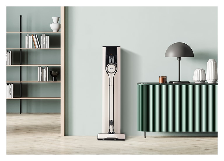 Image of calming green colour LG CordZero All-in-One Tower placed in a modern living room.