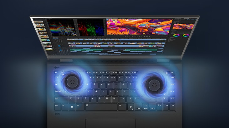 A laptop with a video editing interface on its screen, showcasing dual cooling fans emitting blue airflow visuals, emphasising advanced cooling technology.