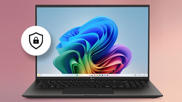 This image shows a laptop displaying a colorful Windows wallpaper with a security shield icon beside it, highlighting the device’s built-in hardware-based protection features.