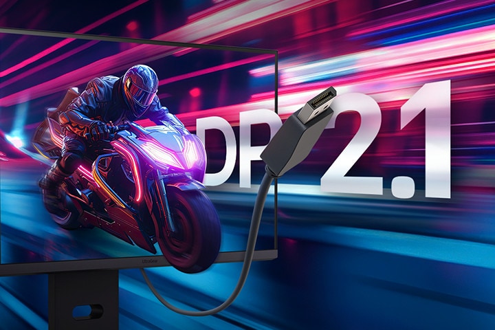 A futuristic motorcyclist emerging from a monitor screen with vibrant neon light trails and a DP 2.1 cable in the foreground.	