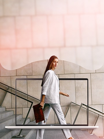  Woman holding a laptop case walking in professional clothes. There is a gram laptop over the image. 