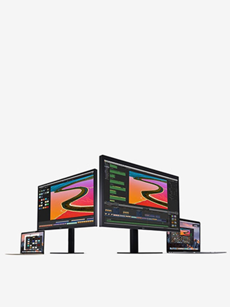 Ultrafine Monitors next to compatible Mac laptop models