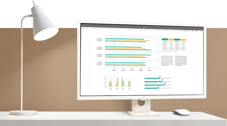 Uma mesa minimalista com o Monitor LG MyView Smart exibindo gráficos e tabelas para produtividade.