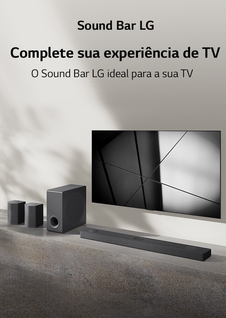 Sound Bar LG com subwoofer e caixas acústicas ao lado de uma TV moderna montada na parede de uma sala minimalista.
