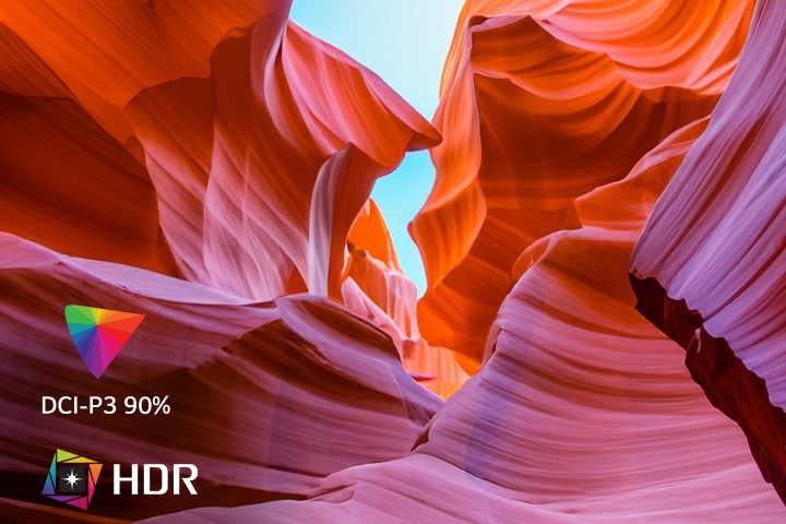 O ecrã apresenta várias cores representando UHD 4K, e no canto inferior esquerdo, existe um logótipo que indica HDR e DCI-P3 90%.
