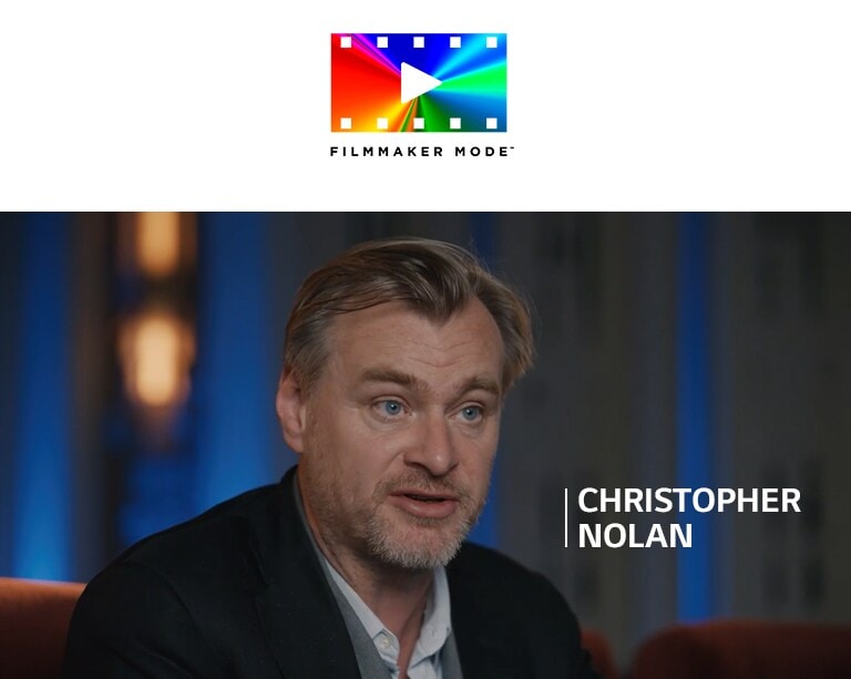 Christopher Nolan sendo entrevistado em uma sala de cinema.