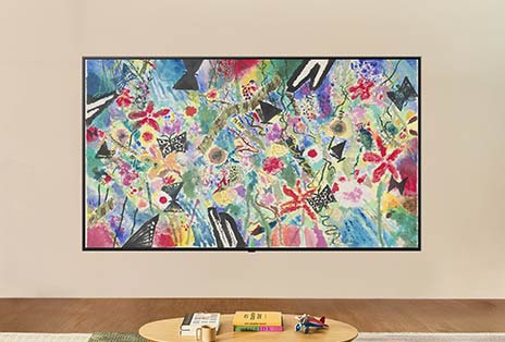 In a bright, well-lit room, the LG TV's screen shows an equally bright artwork showcasing how screen brightness is optimized for viewing in any light.