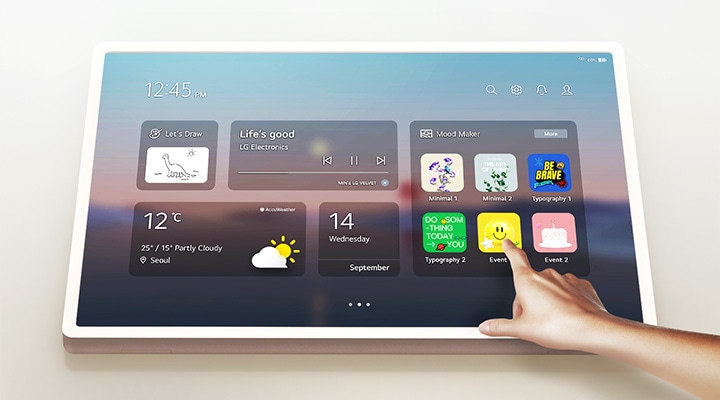 StanbyME 2 with touchscreen in use by a person.
