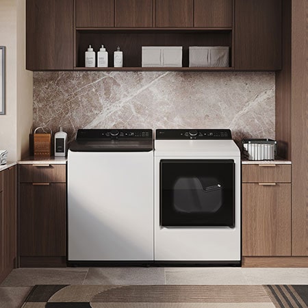 The LG Top Load Washer and Dryer set (WT8400CW) in White, showcasing the flat-top design and clean finish integrated perfectly beneath the upper cabinetry.