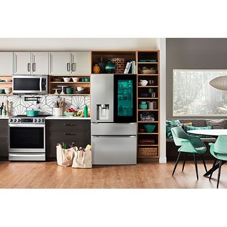 The PrintProof™ Stainless Steel LG 36-inch 29 cu.ft. French Door Refrigerator LF29S8365S with illuminated InstaView® window, in a modern kitchen.