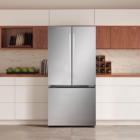 The PrintProof™ Stainless Steel LG 33-inch 25 cu.ft. French Door Refrigerator LF25H6200S, shown installed in a modern kitchen.