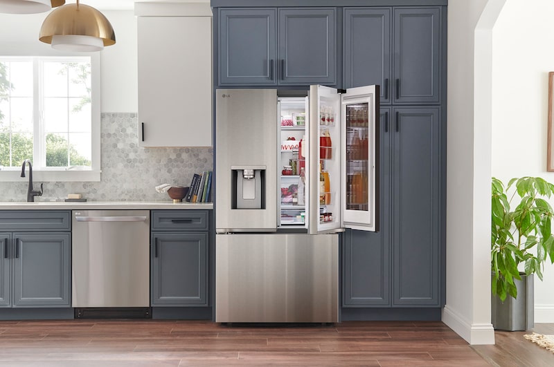 The PrintProof™ Stainless Steel LG 36-inch 31 cu.ft. French Door Refrigerator LF31S6360S, showing the easily accessible Door-in-Door® compartment open.