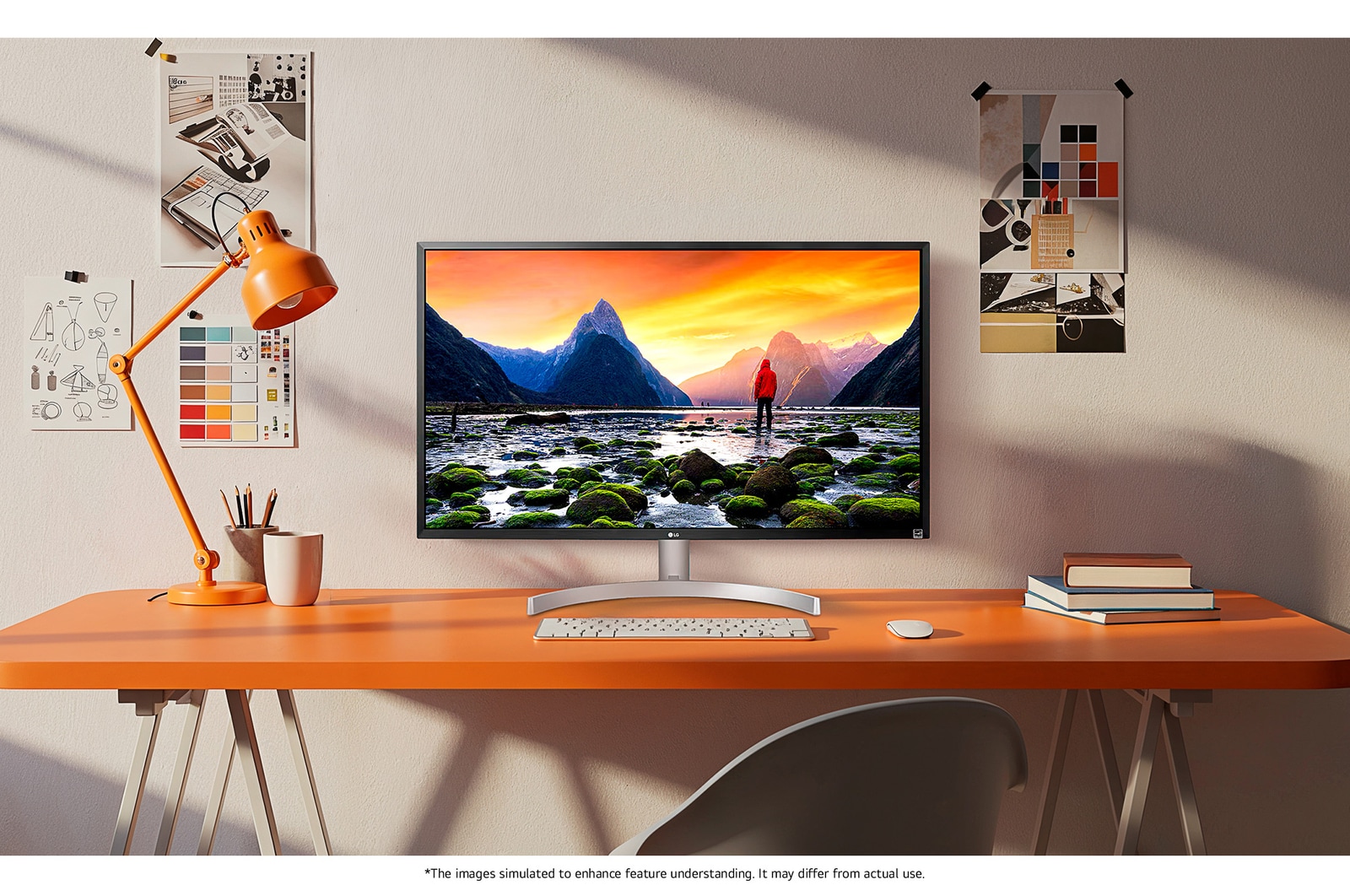 The LG UltraFine™ Monitor 32UL500 in Black/Silver is integrated into a bright, creative workspace, displaying stunning landscape details.