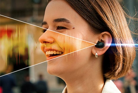 From left to right: A woman is talking on the phone outside wearing T80S, T80S filters out background noise, and the other woman can hear only her voice clearly.