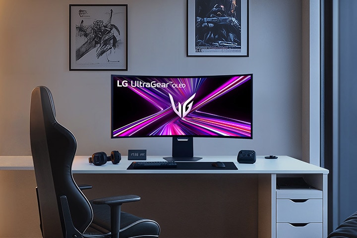 LG UltraGear OLED monitor setup on a gaming desk in a modern room.