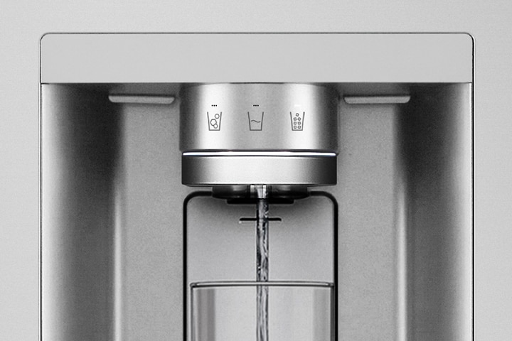 Zoomed-in water dispenser with a cup