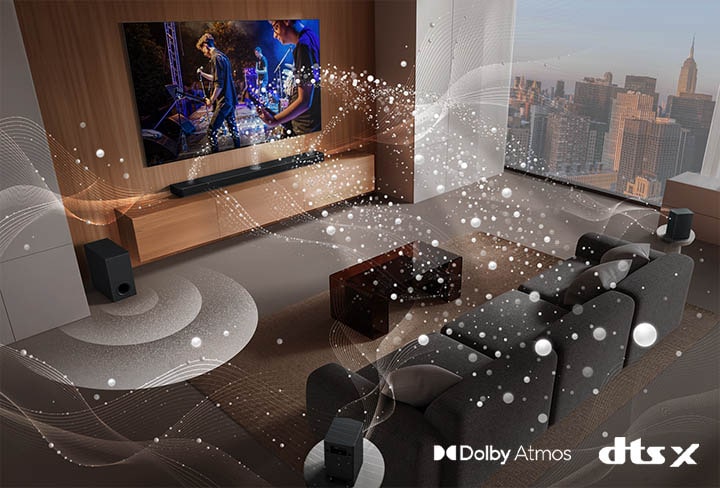 LG Soundbar, LG TV, rear speakers and a subwoofer are in a living room of a skyscraper, playing a musical performance. White soundwaves made up of droplets project from the soundbar, looping around the sofa and living space. A subwoofer is creating a sound effect from the bottom. Dolby Atmos logo DTS X logo