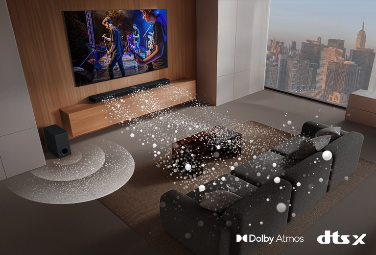 LG Soundbar, LG TV and a subwoofer are in a living room of a skyscraper, playing a musical performance. Three branches of white soundwaves made up of droplets project from the soundbar and a subwoofer is creating a sound effect from the bottom. Dolby Atmos logo DTS X logo