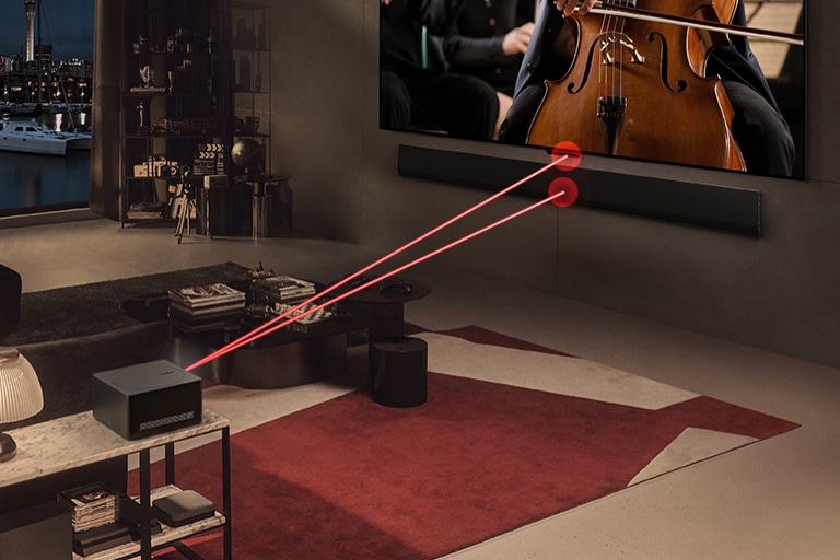 LG OLED evo M4 ekrane groja koncertas, o priešais stovi „Zero Connect Box“. Virš „Zero Connect Box“ pasirodo raudonas „Wi-Fi“ signalas, o du raudonos šviesos spinduliai sklinda į televizorių ir LG Soundbar.