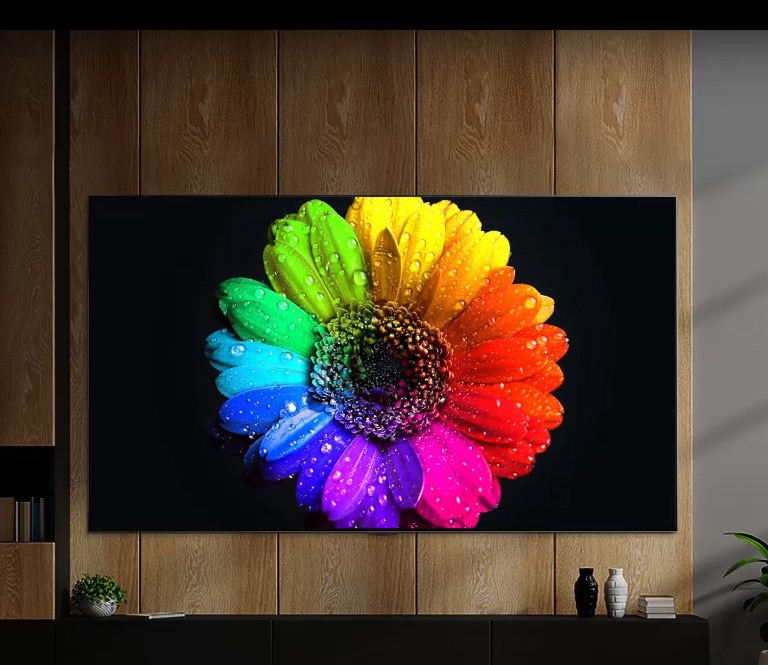 Mini-LED-Lichter im Inneren des Fernsehers leuchten auf und füllen den gesamten Fernsehbildschirm aus und verwandeln sich am Ende in eine sehr bunte Blume auf dem Fernseher.