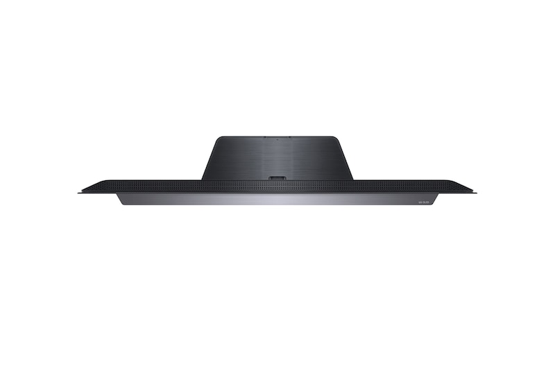 LG TV screen with an AI Magic Remote on the foreground. The AI button is highlighted and a speech bubble shows text, suggest a movie I like. On the screen we see the user icon E, indicating how AI Voice ID was able to identify which user it was and give personalized recommendations just based on their voice.