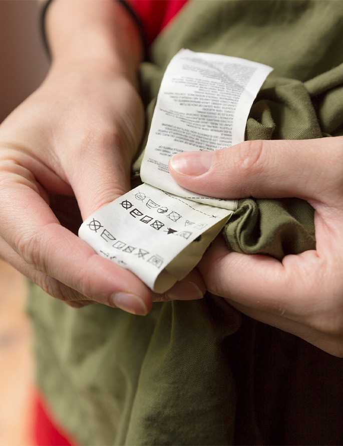 Check clothes labels for washing machine easy care directions.