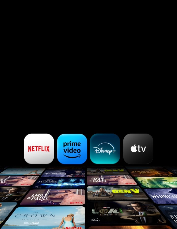Las aplicaciones Netflix, Prime Video, Disney+ y Apple TV aparecen una por una sobre un fondo negro y se colocan una al lado de la otra. Debajo de ellas, 6 filas de carteles de series de TV y películas exclusivas se encuentran en un ángulo, cada una moviéndose en diferentes direcciones horizontales y verticales. 