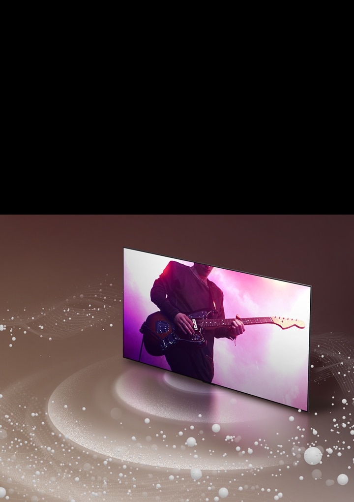 LG OLED TV mientras burbujas y ondas sonoras se emiten desde la pantalla y llenan el espacio.