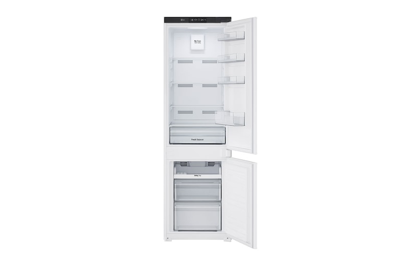 Detailní pohled dovnitř vestavěné ledničky 233L s mrazákem dole, bílé barvy, s funkcí Total No Frost a zásuvkou na čerstvou zeleninu.