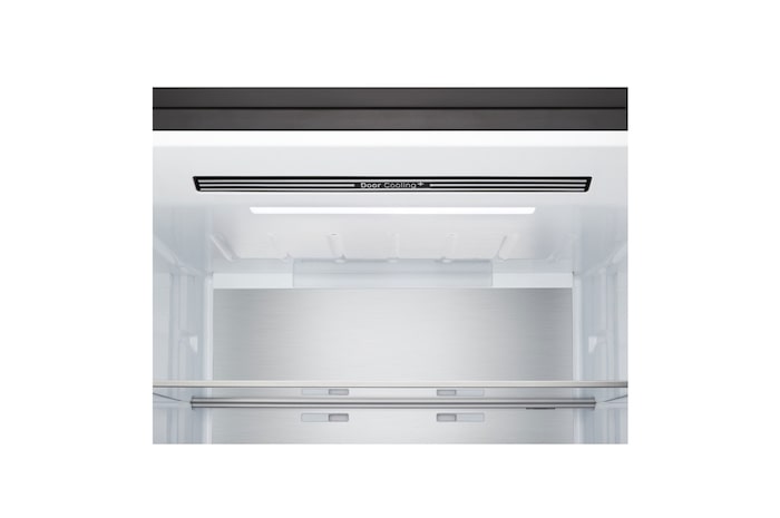 LG bottom freezer (GBBW726AEV) in living space with night city view overlaid with AI Saving Mode graphic and fluctuating energy chart