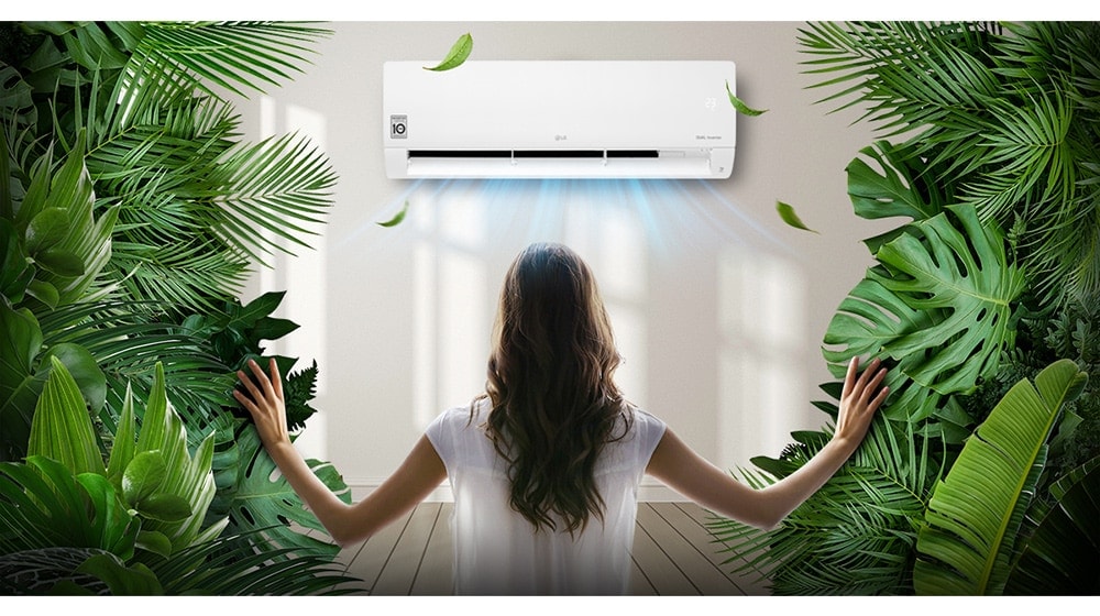 A woman watching the air conditioner in the cool breeze in the thick forest.