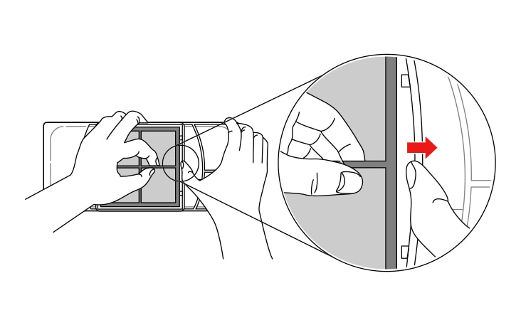 Entferne den Filter von der Innenseite der Abdeckung, indem du die Seite des Filters eindrückst und die Mitte herausziehst