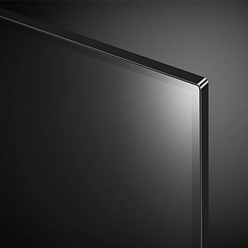 Nahaufnahme der oberen rechten Bildschirm-Ecke des LG OLED AI B4 4K Smart TV mit ultradünner Blende und glänzender Oberfläche.