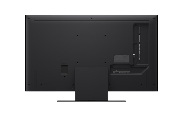 Ein Mädchen und ein Hund sitzen vor einem LG QNED-Fernseher, der an einer Wand montiert ist und drei Elefanten zeigt, die über einer LG Soundbar nach außen laufen. Der Titel spricht davon, dass jede Aktion auf einem großen Bildschirm noch spannender ist.