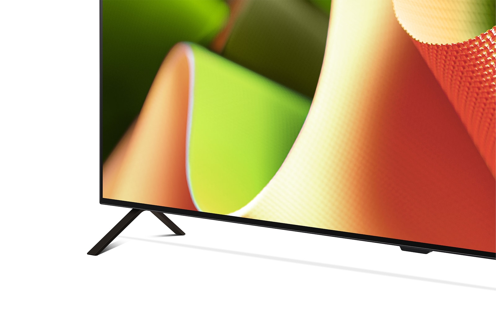 Nahaufnahme des LG OLED TV B4 vom Sockel aus, mit 2-poligem Standfuß