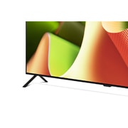 Nahaufnahme des LG OLED TV B4 vom Sockel aus, mit 2-poligem Standfuß