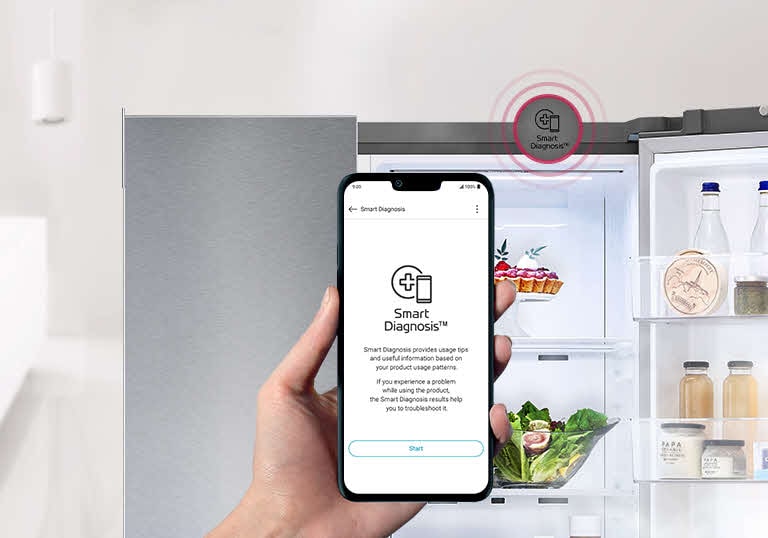 A hand holds a phone. The screen of the phone shows the Smart Diagnosis app. The refrigerator in the background has one side open showing the contents inside. There is a Smart Diagnosis icon above the refrigerator.