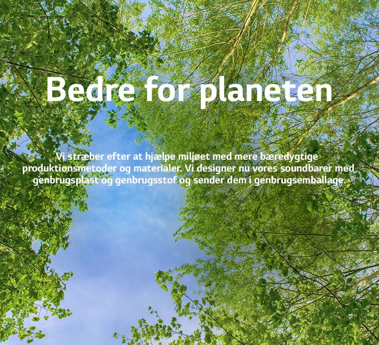 Een groen beeld vol bomen met daartussen de lucht die is te zien