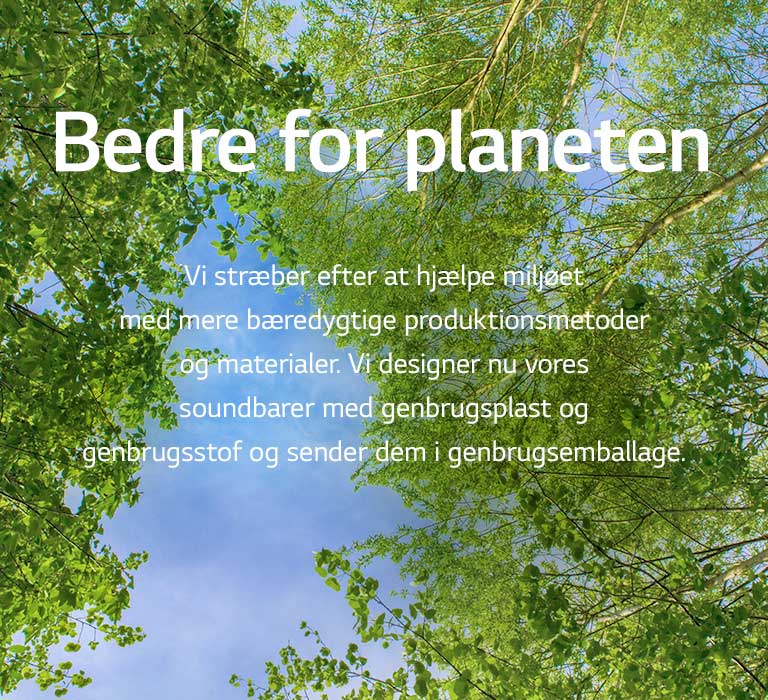 Et grønt billede fuld af store, grønne træer og en himmel vises imellem