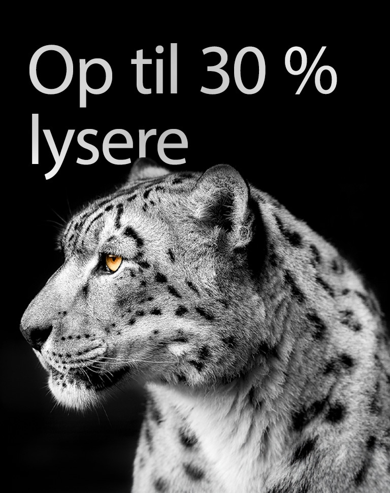 En hvid leopard, der viser sit sideansigt i venstre side af billedet. Teksten "Op til 30 % lysere" vises til venstre.