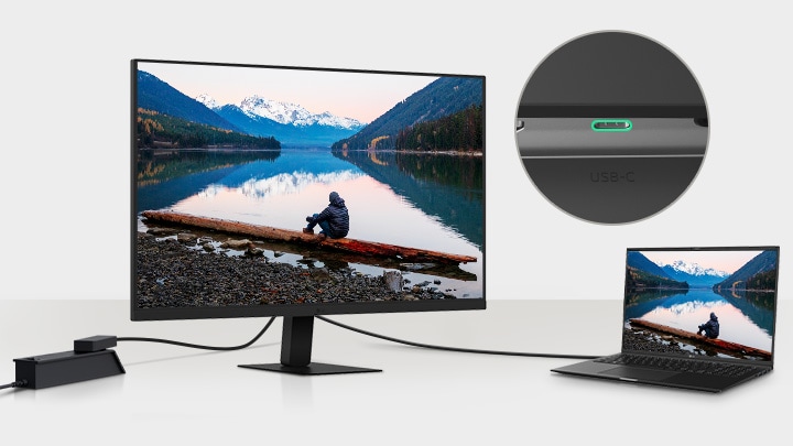 Et billede af en bærbar computer og en skærm, som er forbundet med et enkelt USB-C-kabel.