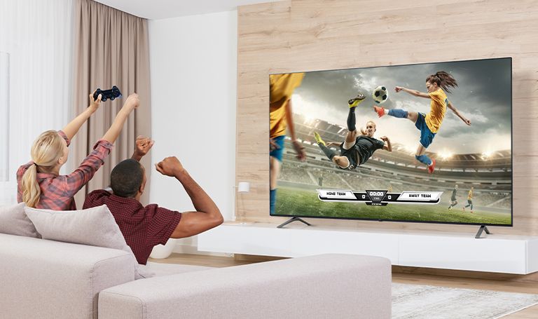 The man and woman are playing games, and the game's scene shown on the TV screen is realistically expressed.