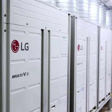 The front-side view of multiple LG Multi V outdoor units, arranged side by side.